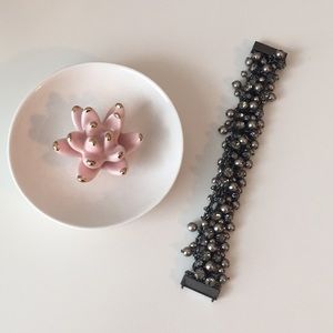 Gunmetal colored bracelet.